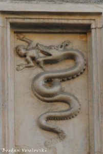 32. The Biscione - the coat of arms of the House of Visconti, from the Archbishops' palace in Piazza Duomo