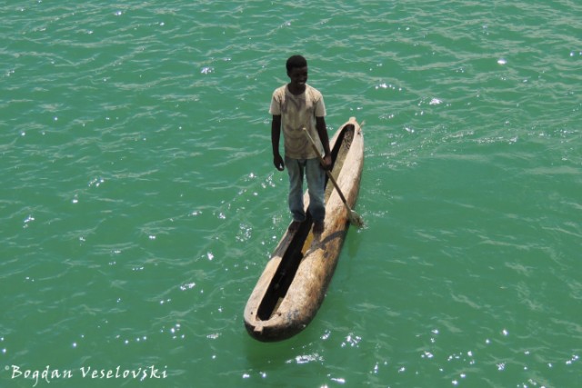 Boy on a canoe