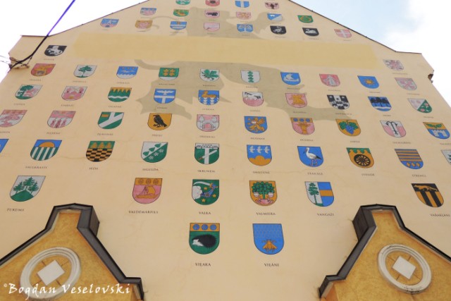 Coat of arms of Latvian towns and cities on the side of Jacob's Barracks